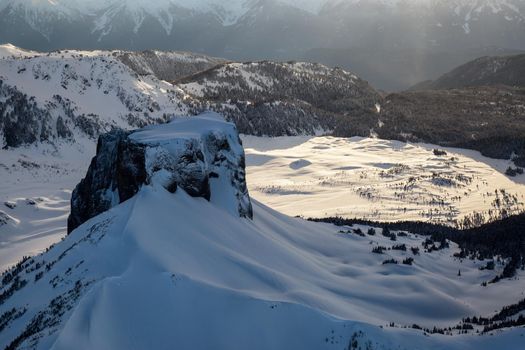 Table Mountain with Garibaldi Lake in the Background from an aerial perspective. Picture taken near Whistler, British Columbia, Canada.