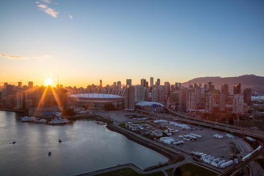 Aerial view of Downtown Vancouver City, BC, Canada, during sunset. Cityscape Background