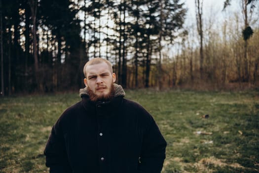 A man stands in a local park