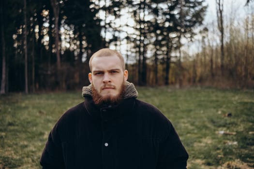 A man stands in a local park