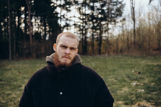 A man stands in a local park