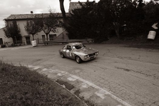 PESARO COLLE SAN BARTOLO , ITALY - OTT 10 - 2021 : ALFA ROMEO JUNIOR SCALINO on an old racing car in rally