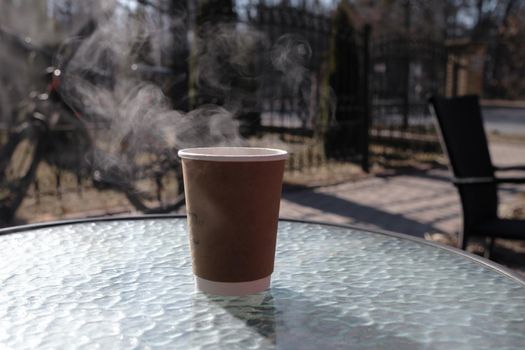 Paper coffee cup in coffee shop tea