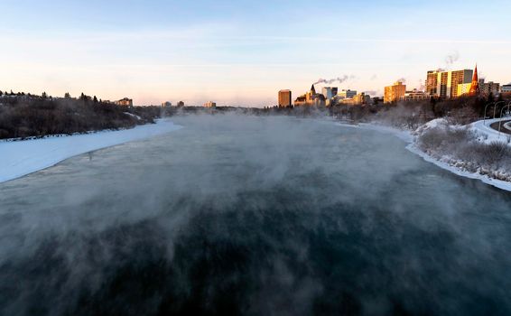 Freezing winter conditions over Saskatchewan River and downtown Skyline