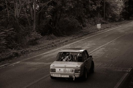 PESARO COLLE SAN BARTOLO , ITALY - OTT 10 - 2021 : BMW 2002 on an old racing car ifor rally