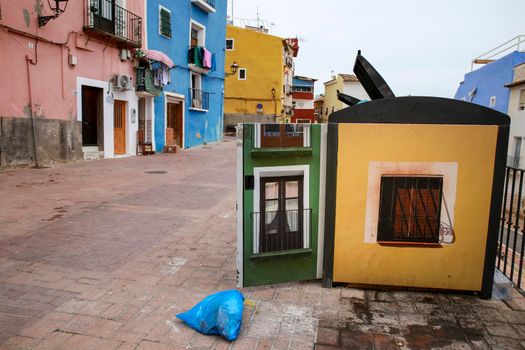 Villajoyosa, Alicante, Spain- April 22, 2022: Garbage container with beautiful paintings on the street