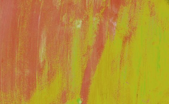 Red-yellow strokes of paint on the surface. Abstract texture.