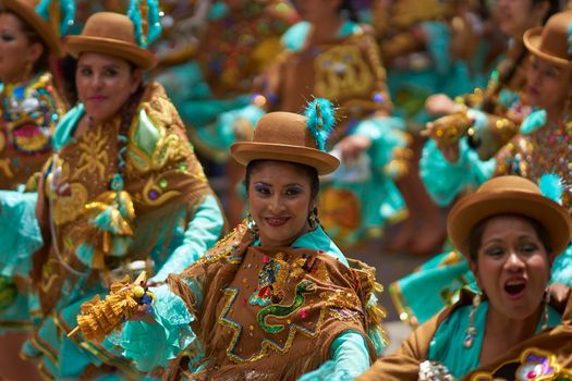 ORURO, BOLIVIA - FEBRUARY 25, 2017: Traditional Bolivian dancer in colourful costume parading through the mining city of Oruro on the Altiplano of Bolivia during the annual Oruro Carnival.