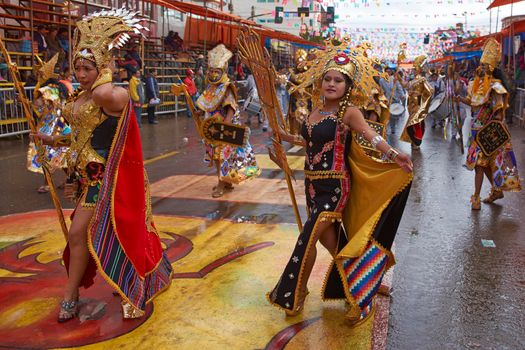 ORURO, BOLIVIA - FEBRUARY 25, 2017: Dancers dressed in ornate Inca style costumes parading through the mining city of Oruro on the Altiplano of Bolivia during the annual carnival.