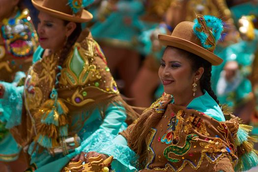 ORURO, BOLIVIA - FEBRUARY 25, 2017: Traditional Bolivian dancer in colourful costume parading through the mining city of Oruro on the Altiplano of Bolivia during the annual Oruro Carnival.