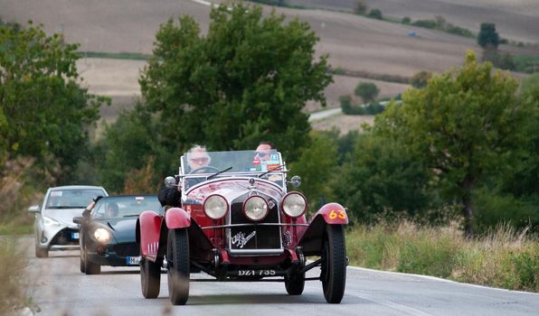 CAGLI , ITALY - OTT 24 - 2020 : J ALFA ROMEO 6C 1750 GS ZAGATO on an old racing car in rally Mille Miglia 2020 the famous italian historical race (1927-1957)