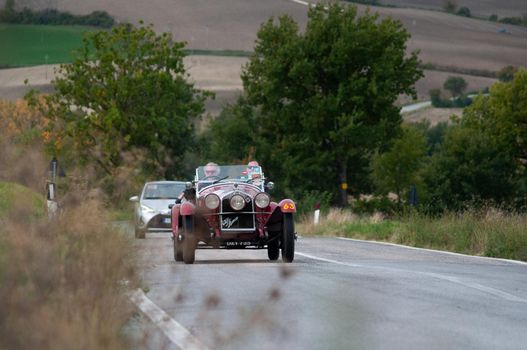 CAGLI , ITALY - OTT 24 - 2020 : J ALFA ROMEO 6C 1750 GS ZAGATO on an old racing car in rally Mille Miglia 2020 the famous italian historical race (1927-1957)