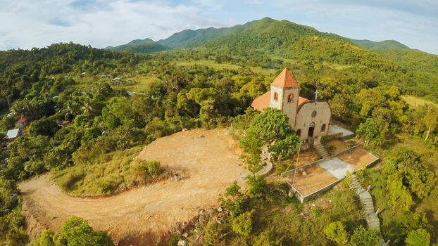 Church on a hill in Malbato village. Philippines. Coron. Palawan. Aerial view