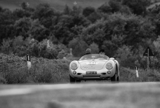 CAGLI , ITALY - OTT 24 - 2020 : PORSCHE 550 SPIDER RS on an old racing car in rally Mille Miglia 2020 the famous italian historical race (1927-1957)