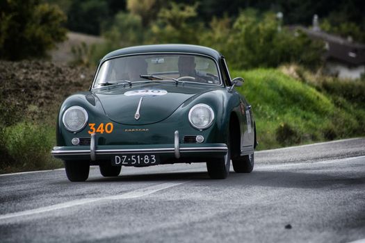 CAGLI , ITALY - OTT 24 - 2020 : PORSCHE 356 SPEEDSTER on an old racing car in rally Mille Miglia 2020 the famous italian historical race (1927-1957)