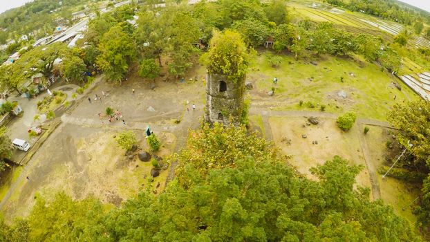 Aerial views the ruins of Cagsawa church, showing Mount Mayon erupting in the background. Cagsawa church. Philippines