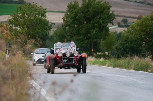 CAGLI , ITALY - OTT 24 - 2020 : J ALFA ROMEO 6C 1750 GS ZAGATO on an old racing car in rally Mille Miglia 2020 the famous italian historical race (1927-1957)