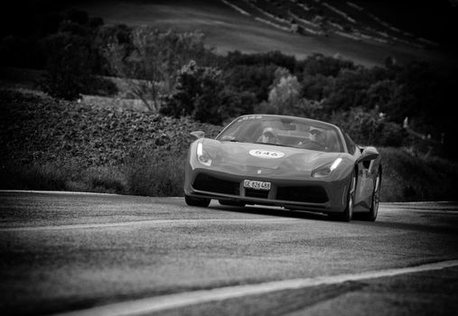 CAGLI , ITALY - OTT 24 - 2020 : FERRARI 488 SPIDER on an old racing car in rally Mille Miglia