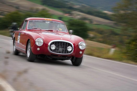 CAGLI , ITALY - OTT 24 - 2020 : FERRARI 212 INTER EUROPA 1953 on an old racing car in rally Mille Miglia 2020 the famous italian historical race (1927-1957)