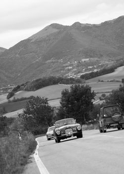 CAGLI , ITALY - OTT 24 - 2020 : ASTON MARTIN DB 2 on an old racing car in rally Mille Miglia 2020 the famous italian historical race (1927-1957)