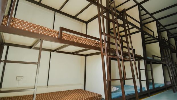 Three-story beds in a budget Asian hostel