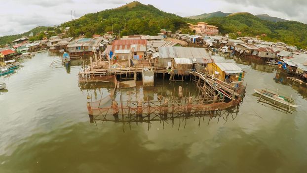 Philippine slums on the beach. Poor area of the city. Coron. Palawan. Philippines