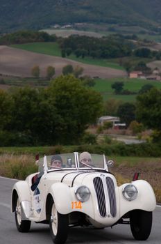 CAGLI , ITALY - OTT 24 - 2020 : BMW 328 1939 on an old racing car in rally Mille Miglia 2020 the famous italian historical race (1927-1957)