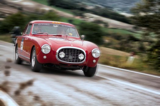 CAGLI , ITALY - OTT 24 - 2020 : FERRARI 212 INTER EUROPA 1953 on an old racing car in rally Mille Miglia 2020 the famous italian historical race (1927-1957)