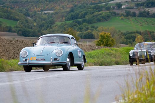 CAGLI , ITALY - OTT 24 - 2020 : PORSCHE 356 A 1600 on an old racing car in rally Mille Miglia 2020 the famous italian historical race (1927-1957)