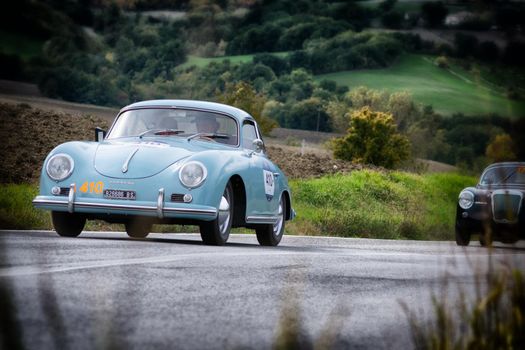 CAGLI , ITALY - OTT 24 - 2020 : PORSCHE 356 A 1600 on an old racing car in rally Mille Miglia 2020 the famous italian historical race (1927-1957)