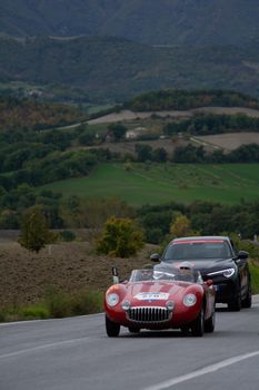 CAGLI , ITALY - OTT 24 - 2020 : OSCA mt 4 1500 2ad on an old racing car in rally Mille Miglia 2020 the famous italian historical race (1927-1957