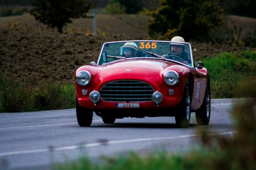 CAGLI , ITALY - OTT 24 - 2020 : AC ACE 1956 on an old racing car in rally Mille Miglia 2020 the famous italian historical race (1927-1957