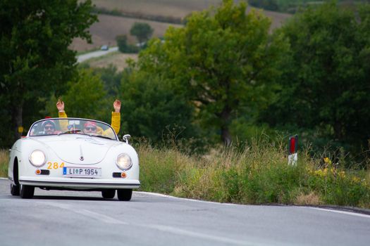 CAGLI , ITALY - OTT 24 - 2020 : PORSCHE 356 SPEEDSTER on an old racing car in rally Mille Miglia 2020 the famous italian historical race (1927-1957)