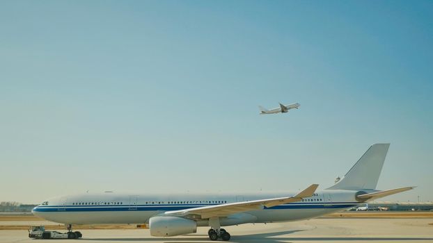 passenger plane fly up over take-off runway from airport