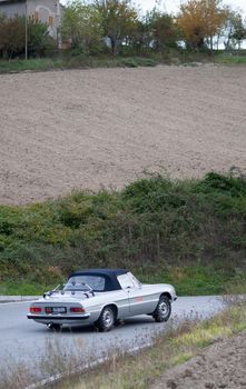 CAGLI , ITALY - OTT 24 - 2020 : ALFA ROMEO SPIDER CODA TRONCA on an old racing car in rally Mille Miglia