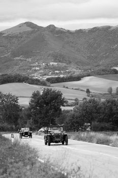 CAGLI , ITALY - OTT 24 - 2020 : OM 665 SUPERBA on an old racing car in rally Mille Miglia 2020 the famous italian historical race (1927-1957)