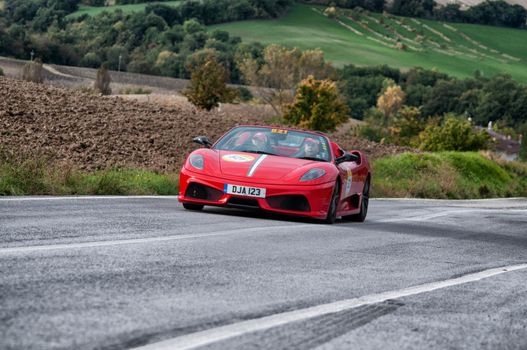 CAGLI , ITALY - OTT 24 - 2020 : FERRARI SCUDERIA SPIDER 16M on an old racing car in rally Mille Miglia 2020 the famous italian historical race (1927-1957)