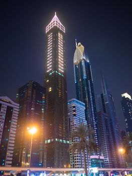 Night view of Dubai Downtown with skyscrapers