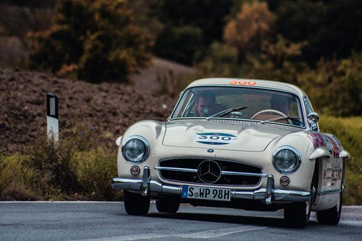 CAGLI , ITALY - OTT 24 - 2020 : MERCEDES-BENZ 300 SL W 198 1954 on an old racing car in rally Mille Miglia 2020 the famous italian historical race (1927-1957)