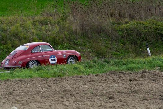 CAGLI , ITALY - OTT 24 - 2020 : PORSCHE 356 A CARRERA 1500 GS 1956 on an old racing car in rally Mille Miglia 2020 the famous italian historical race (1927-1957)