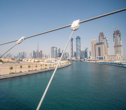 Panorama of the city of Dubai from the bridge of the river channel Dubai Creek.