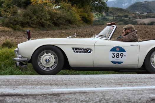 CAGLI , ITALY - OTT 24 - 2020 : BMW 507 TOURING SPORT 1957 on an old racing car in rally Mille Miglia 2020 the famous italian historical race (1927-1957)