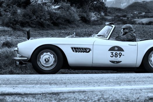 CAGLI , ITALY - OTT 24 - 2020 : BMW 507 TOURING SPORT 1957 on an old racing car in rally Mille Miglia 2020 the famous italian historical race (1927-1957)