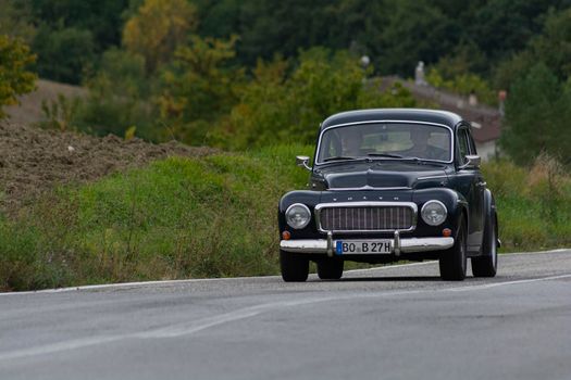 CAGLI , ITALY - OTT 24 - 2020 : volvo on an old racing car in rally Mille Miglia 2020 the famous italian historical race (1927-1957)