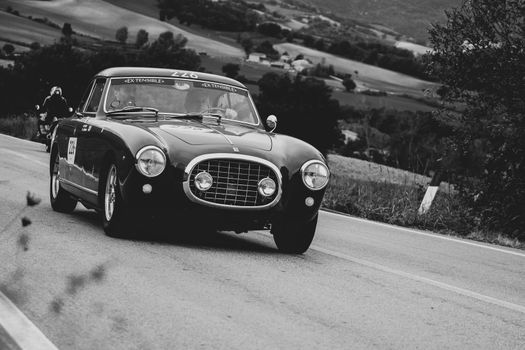 CAGLI , ITALY - OTT 24 - 2020 : FERRARI 212 INTER EUROPA 1953 on an old racing car in rally Mille Miglia 2020 the famous italian historical race (1927-1957)