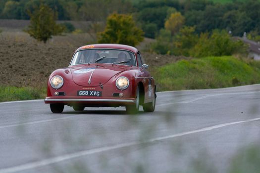 CAGLI , ITALY - OTT 24 - 2020 : PORSCHE 356 A CARRERA 1500 GS 1956 on an old racing car in rally Mille Miglia 2020 the famous italian historical race (1927-1957)