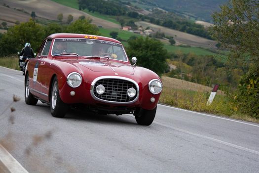 CAGLI , ITALY - OTT 24 - 2020 : FERRARI 212 INTER EUROPA 1953 on an old racing car in rally Mille Miglia 2020 the famous italian historical race (1927-1957)