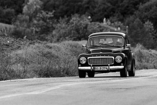 CAGLI , ITALY - OTT 24 - 2020 : volvo on an old racing car in rally Mille Miglia 2020 the famous italian historical race (1927-1957)