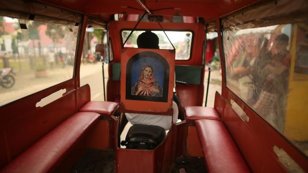 Inside the car is a Jeepney taxi on the Philippine.