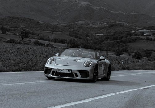 2020 : porsche 911 speedster on an old racing car in rally Mille Miglia 2020 the famous italian historical race (1927-1957